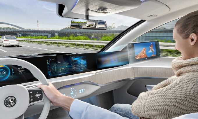 Màn hình với công nghệ mới của Continental giúp hành khách thoải mái xem phim mà không làm ảnh hưởng tới tài xế. Ảnh: Continental
